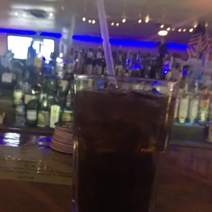 a drink in a tall glass