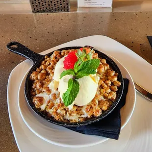 a skillet of food on a plate