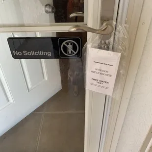 Hung RIGHT NEXT TO the No Soliciting sign