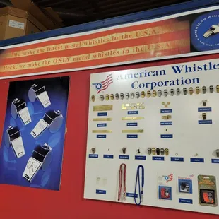 Whistle and accessory examples on the wall