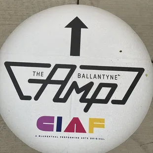 Signage on sidewalks as you walk up to the event space