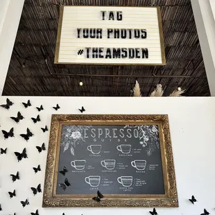 a chalkboard with a sign above it