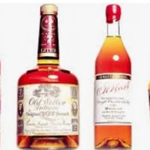 three bottles of maker's mark whiskey