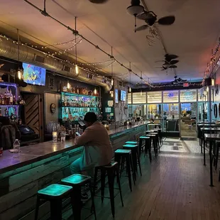 a man sitting at the bar