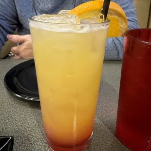 Tiki Torch: Bacardi Silver Rum, Malibu Coconut Rum, pineapple juice, orange juice, and grenadine.
