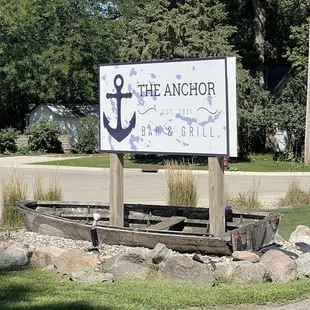 a sign for the anchor restaurant and grill