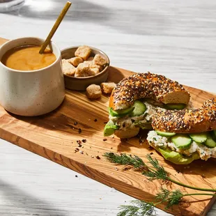 a bagel sandwich on a cutting board