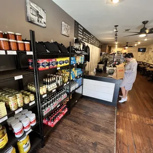 a woman standing in front of the counter