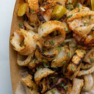 Grilled Calamari with pickled peppers and Cajun seasoning