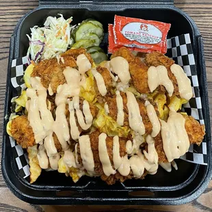 Combo #4: Two Tenders over a bed of fries with mac and cheese!
