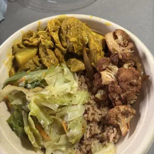 To-go bowl. Rice &amp; Peas, cabbage, curry chicken, jerk cauliflower