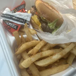 Cheeseburger and fries that are seasoned, very thick, like steak fries, crispy. and delish.  Miles better than any fast food burger.