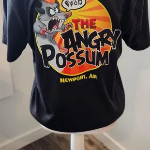 a t - shirt on a mannequin stand