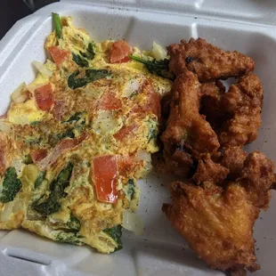 an omelet and fried chicken