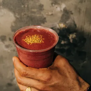 Matcha Julius smoothie with fresh squeezed orange juice, cherries, Greek yogurt, adaptogens, matcha, bee pollen, vanilla and rose