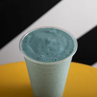 Sapphire Skies Smoothie with coconut water, mango, pineapple, banana, coconut cream, collagen, chia seeds, blue spirulina