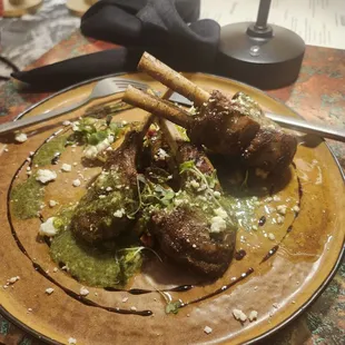 The herb-crusted rack of lamb with roasted Brussels sprouts, mint pesto and balsamic glaze
