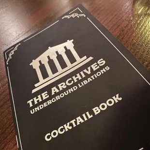 a cocktail book on a table