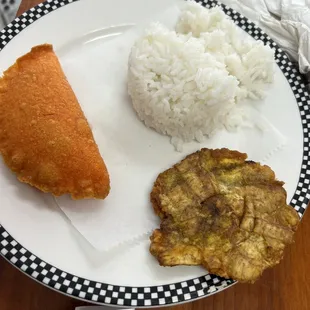 Kids empanada with rice.