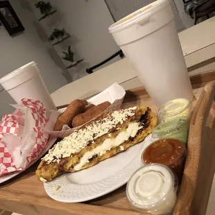 Cachapa with cheese, tequeños and Maracuya (passion fruit) juice.