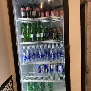 A cooler of soft drinks