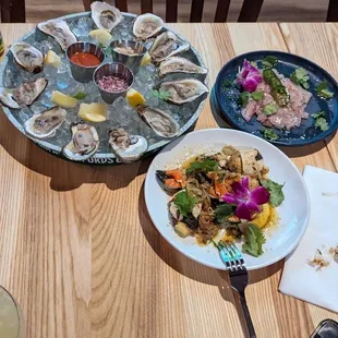 Oysters On The Half-Shell, Hamachi Crudo, and Crab Claws