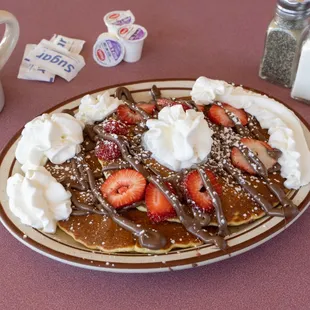 Short Stack of Pancakes with Nutella, Strawberries, and Whipped Cream!