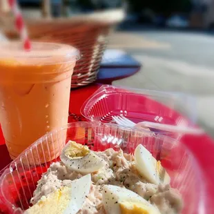 Thai ice tea; tuna salad with hard boiled egg.