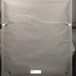 High Quality Backing of Wedding Picture with wiring to hand on wall.