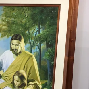 Close up of new cream colored matting used to replace old green velvet matting. Frame is koa veneer.