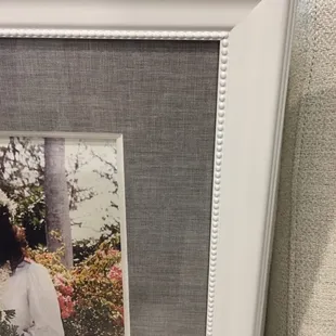 Close Up of Gray Matte and White Detailed Wooden Custom Frame