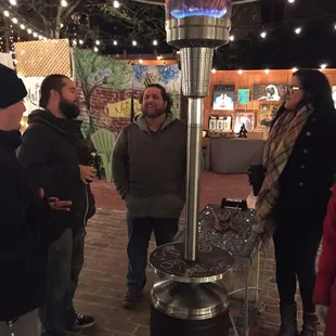 The Art Garden is an artist run, family owned and operated outdoor gallery &amp; community creative space.  Local gallery artists laugh at cold!