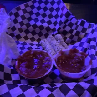 two bowls of ketchup