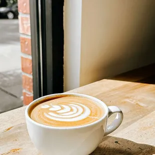 a cup of coffee on a table