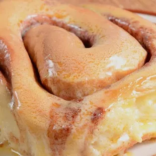 a cinnamon roll on a plate