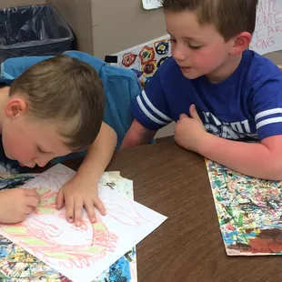 These boys in our preschool art program really learn a lot from each other by watching, sharing and taking turns.