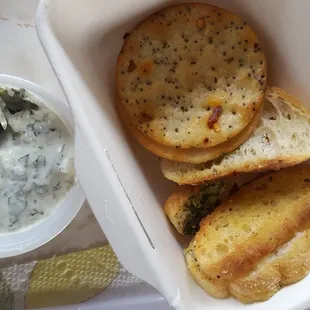 Take out artichoke dip (complimentary with orders)