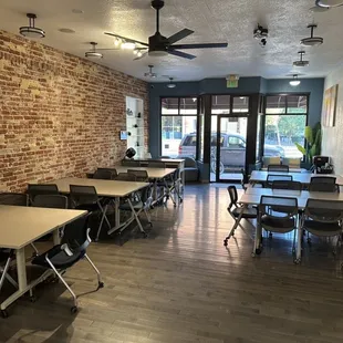 Photo from the back of the main room looking towards the front.