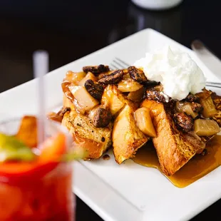a plate of french toast and a drink