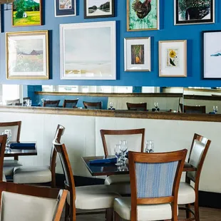 a dining room with blue walls