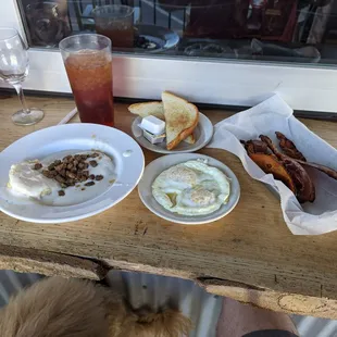 Biscuits and sausage gravy, over easy eggs, sourdough toast, bacon, and fantastic sweet tea!