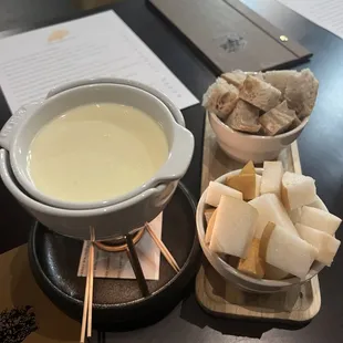 Sweet Grass Dairy Thomasville tome fondue with sourdough bread and kieffer pears