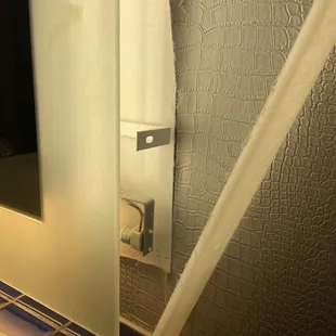 Unassembled bathroom light at checkin