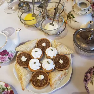 Pumpkin spice cheesecake, miniature bourbon pecan tart, apple turnover sweet glaze
