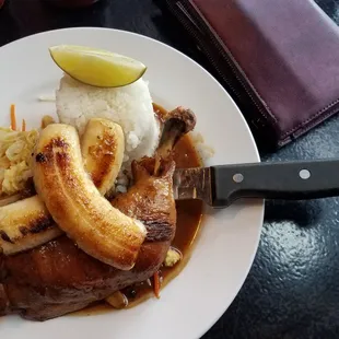 Adobo with pancit and glazed bananas.