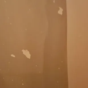 Paint flakes coming off the bathtub