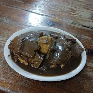 Open faced roast beef sandwich.