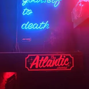 a neon sign that reads don&apos;t follow yourself to death