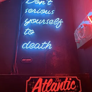 a neon sign that reads don&apos;t believe yourself to death