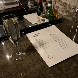 Glass of prosecco with the Cans and Bottles/wine menu.